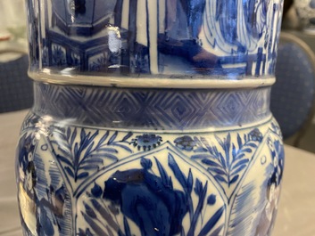 A pair of large Chinese blue and white 'Long Eliza' beaker vases, Kangxi